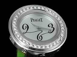 PIAGET 伯爵 Possession P10402 18K白金材質 <font color="#05f0f0">原廠鑲嵌鑽石旋轉錶圈</font> 石英機芯&nbsp;29mm
