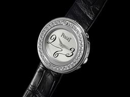 PIAGET 伯爵 Possession P10402 18K白金材質 <font color="#05f0f0">原廠鑲嵌鑽石旋轉錶圈</font> 石英機芯&nbsp;29mm