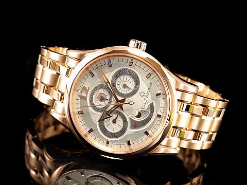 Carl F. Bucherer 寶齊萊 Manero 馬利龍 00.10902.03.16.01 18K玫瑰金材質 鏈帶款&nbsp;萬年歷 月相顯示功能&nbsp;新錶參考訂價：1,900,000元 整支重約4.9兩&nbsp;自動上鍊 40mm