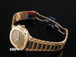 Patek Philippe 百達翡麗 PP 金鷹 鸚鵡螺 7118/1R-010&nbsp; 18K玫瑰金材質&nbsp;<font color="#ead4ae">水平橫紋浮雕香檳金色面盤</font><font color="#0000E3"> </font><font color="#FF0000">&nbsp;2026年保單 保有部分原廠膠膜</font> 自動上鍊 35.2mm