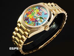 ROLEX 勞力士 Day-Date 36 蠔式 星期日曆型 128238 DD36 18K黃金材質 <font color="#05f0f0">稀有款 Puzzle Dial Tiffany 綠松石色拼圖面盤 每天都是不同圖案的日期窗</font> <font color="#fa00fa">彩虹色寶石時標</font> <font color="#FF0000">2026年保卡 元首型(President)錶帶 總統帶</font> 自動上鍊 36mm
